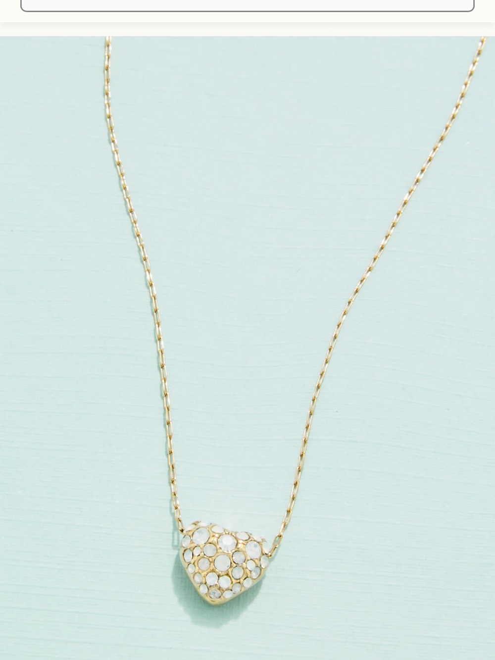 Gold Heart Pendant Necklace with White Crystal Accents